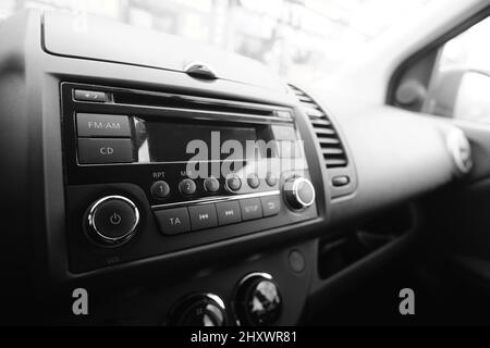 Multimedia system in car. Black and white photo of car interior. Stock Photo