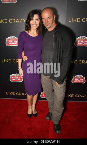 Finola Hughes and husband Russell Young during the 'Like Crazy' Los Angeles premiere held at the Egyptian Theatre, California Stock Photo