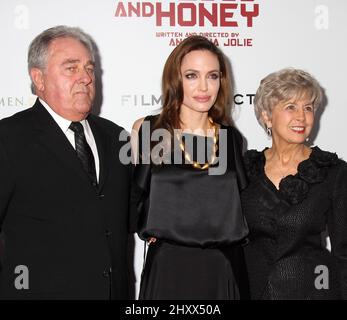 Bill Pitt, Angelina Jolie and Jane Pitt during the premiere of 'In the Land of Blood and Honey' at The School of Visual Arts Theater in New York City. Stock Photo