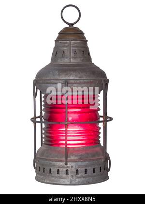 Antique Railroad Lantern lit from within, isolated on white Stock Photo