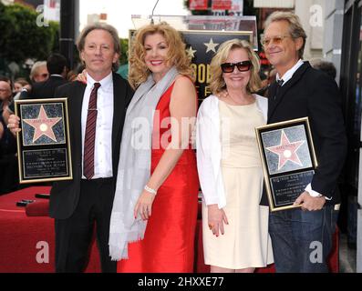 Dewey Bunnell, wife Penny, Gerry Beckley, wife Kathy of the group 'America' receiving a star on the Hollywood Walk Of Fame, Los Angeles Stock Photo