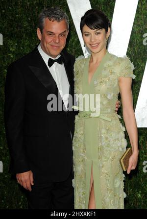 Danny Huston and Olga Kurylenko attending the 2012 Vanity Fair Oscar Party held at the Sunset Towers Hotel in Los Angeles, USA. Stock Photo