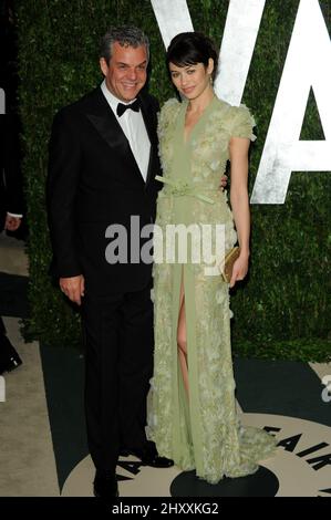 Danny Huston and Olga Kurylenko attending the 2012 Vanity Fair Oscar Party held at the Sunset Towers Hotel in Los Angeles, USA. Stock Photo