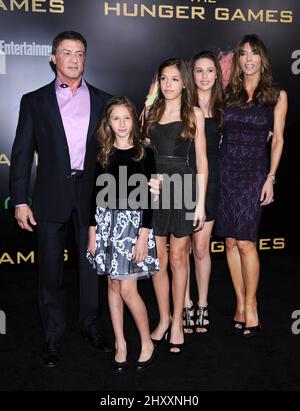 Sylvester Stallone, Jennifer Flavin and daughters attending 'The Hunger Games' world premiere held at the Nokia Theatre L.A. Live in Los Angeles, USA. Stock Photo