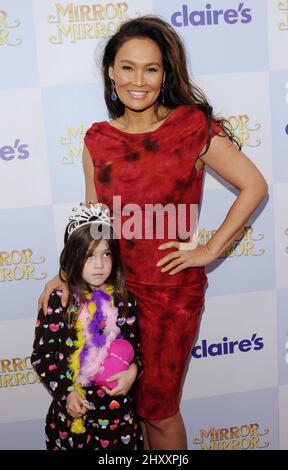 Tia Carrere and daughter attending the 'Mirror Mirror' Los Angeles premiere held at Grauman's Chinese Theatre in Los Angeles, USA. Stock Photo