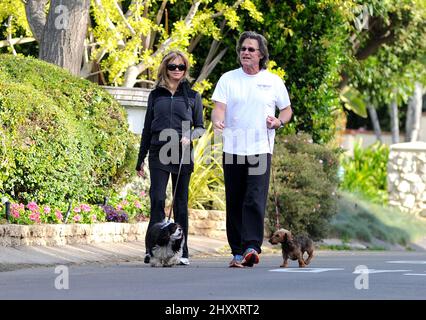 Goldie Hawn and Kurt Russell are seen walking their dogs in Brentwood in Los Angeles, USA. Stock Photo