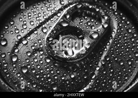 Close-up of aluminium beverage can drink with water drops. Closed beer can with drops of water condensate. Stock Photo
