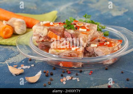 Pihtije - serbian traditional dish - aspic with pork meat and vegetables. Meat jelly - holodets, pihtija or galareta. Stock Photo