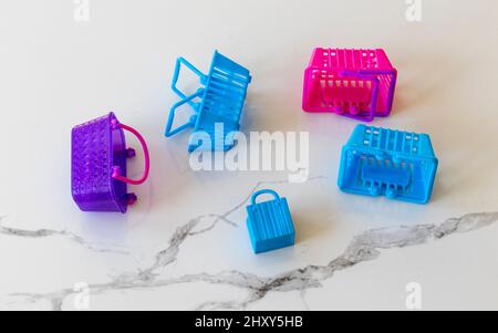 Miniature toy shopping bags empty consumer and market place concept Stock Photo