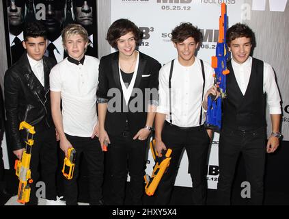 One Direction arrives at the premiere of 'Men in Black 3' at the Ziegfeld Theater on Wednesday May 23, 2012 in New York. Stock Photo