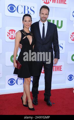 Lucy Liu and Jonny Lee Miller attends the CBS, Showtime and The CW Summer 2012 TCA Party held at the Beverly Hilton Hotel, Los Angeles. Stock Photo