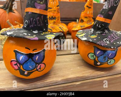 Decorative gourds and pumpkins on display in a retail grocery store during the Fall in Georgia Stock Photo