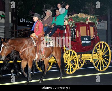 Lou Ferrigno, Louis Ferrigno Jr. arriving at the 2012 Hollywood Christmas Parade in Hollywood, California. Stock Photo