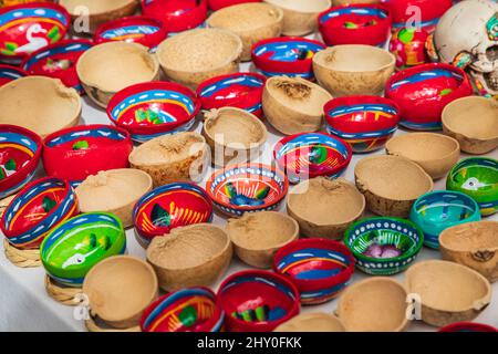Todos Santos, Baja California Sur, Mexico. November 11, 2021. Colorful painted bowls made from half coconut shells. Stock Photo
