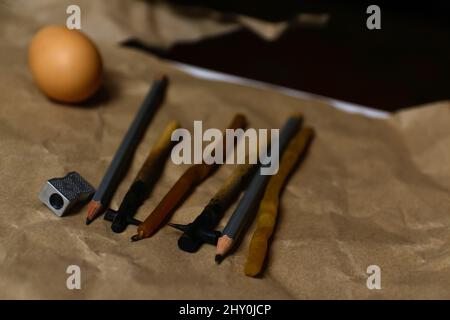 Rustic Easter background. Tools for decorating Paschal eggs, Pysankas. Collection of eggs. Homemade pen for drawing eggs. Preparation for holiday. Cra Stock Photo