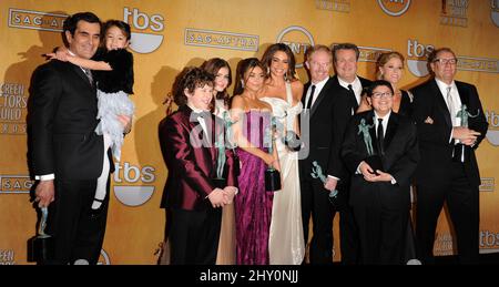 Modern Family Cast Ty Burrell, Aubrey Anderson-Emmons, Ariel Winter, Sarah Hyland, Sofia Vergara, Jesse Tyler Ferguson, Nolan Gould, Eric Stonestreet, Rico Rodriguez, Julie Bowen and Ed O'Neill pose in the press room at the 19th Annual Screen Actors Guild (SAG) Awards. Stock Photo