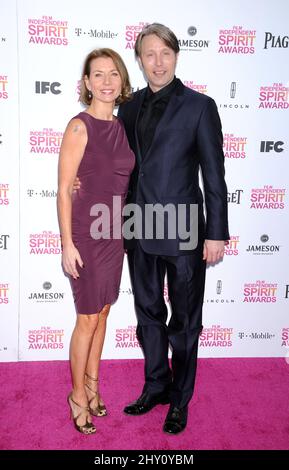 Mads Mikkelsen and Hanne Jacobsen attending the 2013 Independent Spirit Awards at Santa Monica in California. Stock Photo