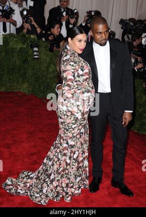 Kim Kardashian, Kanye West attending the the 'Punk': Chaos to Couture' Costume Institute Benefit Met Gala at the Metropolitan Museum in New York. Stock Photo