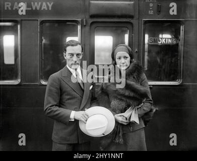 Silent film star Buster Keaton with his wife Natalie Talmadge, sister of film stars Constance and Norma Talmadge, circa 1930. File Reference # 34145-684THA Stock Photo