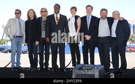 Glenn Frey, Timothy B. Schmit, Joe Walsh, James T. Butts Jr., Melissa Ormond, Hank J. Ratner, James L. Dolan and Irving Azoff at a press conference for the Madison Square Garden Company to announce the revitalisation of The Forum during a press conference at the old Forum Stock Photo