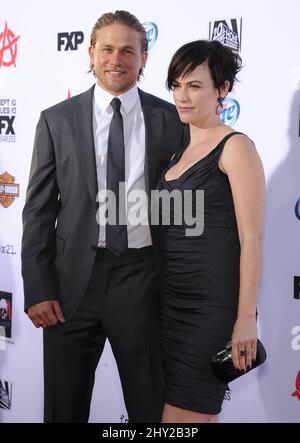 Charlie Hunnam & Maggie Siff attends the season six premiere for Sons of Anarchy Stock Photo