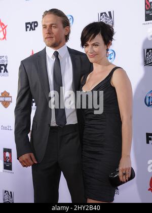 Charlie Hunnam & Maggie Siff attends the season six premiere for Sons of Anarchy Stock Photo