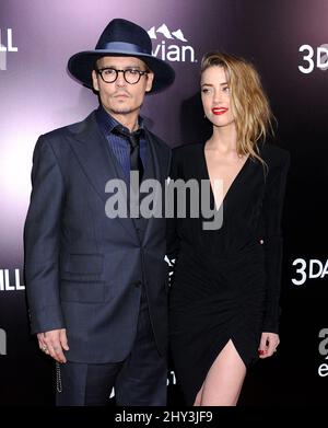 Johnny Depp and Amber Heard attending the '3 Days To Kill' US Premiere at ArcLight Theatre in Los Angeles, USA. Stock Photo