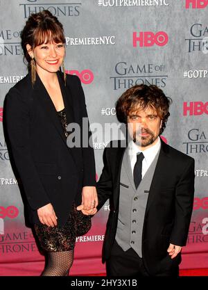 Erica Schmidt and Peter Dinklage attending the season four premiere of Game of Thrones in New York. Stock Photo