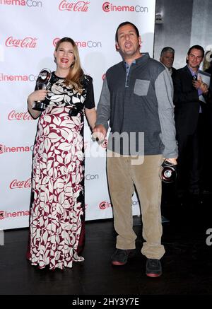 Drew Barrymore and Adam Sandler celebrating with their awards as they attend CinemaCon 2014 'The Big Screen Achievement Awards' held at Pure Nightclub at Caesars Palace Stock Photo