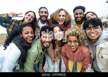 Happy group of multiethnic young friends Stock Photo