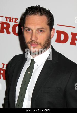 Tom Hardy holds dog Rocco from the film as he arrives to the premiere of The  Drop at The Sunshine Theater in New York City, NY, USA on September 8th,  2014. Photo