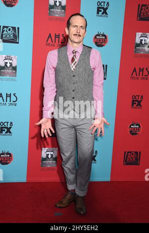 Denis O'Hare attends the 'American Horror Story: Freak Show' Season Premiere at the Chinese Theatre Stock Photo