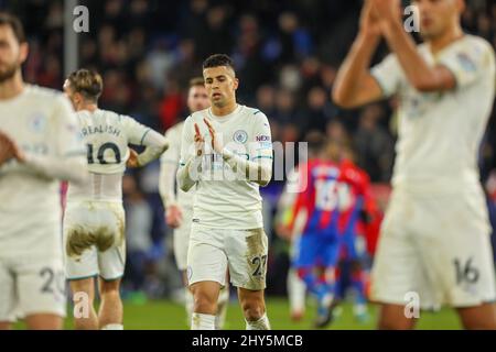 London, UK. 14th March 2022 ; Selhurst Park, Crystal Palace, London, England;  Premier League football, Crystal Palace versus Manchester City; Joao Cancelo of Manchester City applauds Manchester City fans. Credit: Action Plus Sports Images/Alamy Live News Stock Photo