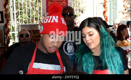 Kylie Jenner, Tyga during the Los Angeles Mission Thanksgiving Meal For The Homeless, held at Los Angeles Mission Stock Photo