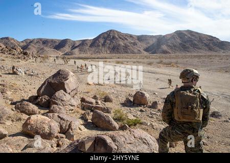 U.S. Marine Corps Sgt. Maj. Troy E. Black, the 19th Sergeant Major of the Marine Corps, observes as Marines with 3rd Battalion, 3rd Marine Littoral Regiment, conduct their Initial Training Exercise (ITX) at Marine Corps Air Ground Combat Center, Twentynine Palms, California, March 4, 2022. The sergeant major conducted the visit to observe a company attack on range 400, the most dynamic range offered in the Marine Corps. ITX is a 28-day training evolution that involves a series of progressive live-fire events that assess the ability and adaptability of Marine Corps rifle companies. (U.S. Marine