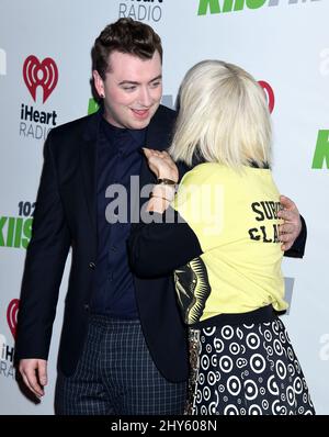 Rita Ora and Sam Smith arrives for KIIS FM's Jingle Ball concert held at Staples Center, Los Angeles. Stock Photo