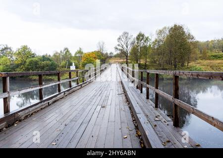 wooden bridge over the river. automobile wooden bridge Stock Photo