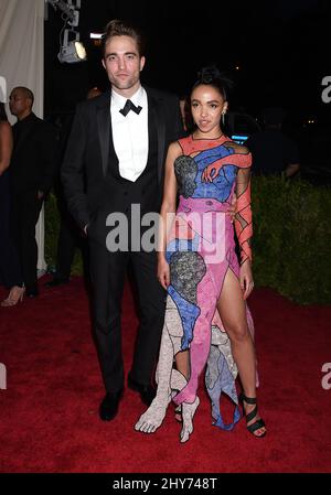 Robert Pattinson & Tahliah Debrett Barnett (FKA twigs) attending The Metropolitan Museum of Art Met Gala, in New York City, USA. Stock Photo