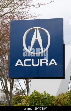 Bellevue, WA, USA - March 13, 2022;  Sign with emblem for an Acura car dealership, the luxury division of the Japenese automaker Honda Stock Photo