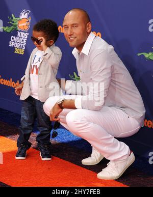 L-R) Jalen Jeter-Martin and Derek Jeter arrives at the Nickelodeon's Kids'  Choice Sports 2015 held at the UCLA's Pauley Pavilion in Westwood, CA on  Thursday, July 16, 2015. (Photo By Sthanlee B.