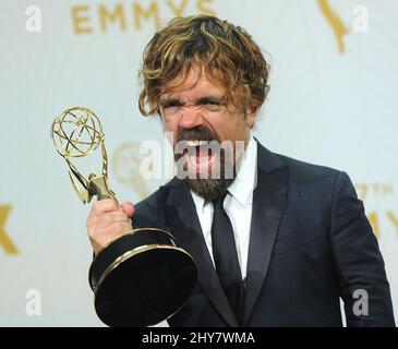 Peter Dinklage poses in the press room at the 67th Primetime Emmy Awards on Sunday, Sept. 20, 2015, at the Microsoft Theater in Los Angeles. Stock Photo