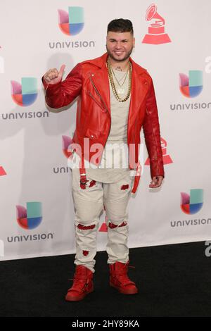 Farruko poses in the press room at the 16th annual Latin Grammy Awards at the MGM Grand Garden Arena on Thursday, Nov. 19, 2015, in Las Vegas.. Stock Photo