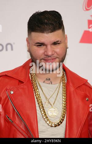 Farruko poses in the press room at the 16th annual Latin Grammy Awards at the MGM Grand Garden Arena on Thursday, Nov. 19, 2015, in Las Vegas.. Stock Photo