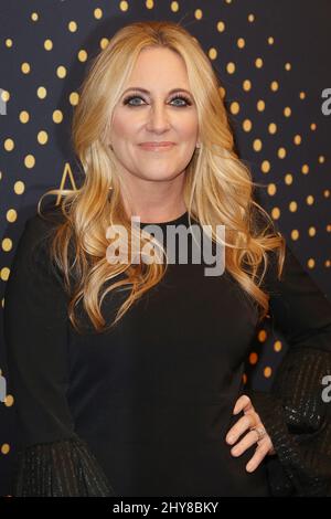 Country artists Lee Ann Womack and Kris Kristofferson present the