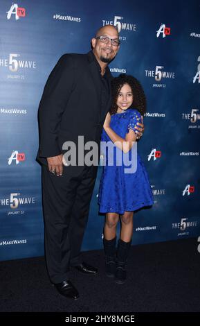 Former Major League Baseball player David Justice, left, and his daughter  Raquel pose together at a special screening of the film The 5th Wave on  Thursday, Jan. 14, 2016, in Los Angeles. (