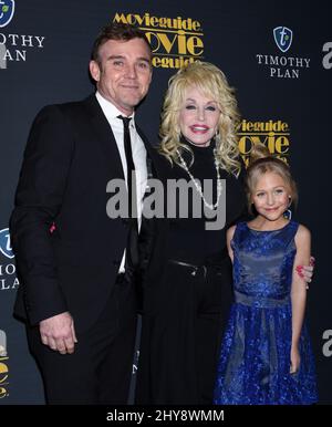 Ricky Schroder, Dolly Parton and Alivia Lyn Lind attending the 24th Annual MovieGuide Awards held at the Universal Hilton Hotel in Universal City, California. Stock Photo