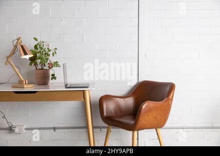 Desk top home office work space with plants and computer. Stock Photo