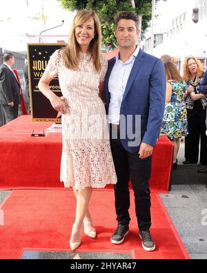 Allison Janney, Philip Joncas attending Alison Janney's Hollywood star walk of fame ceremony in Los Angeles, California. Stock Photo