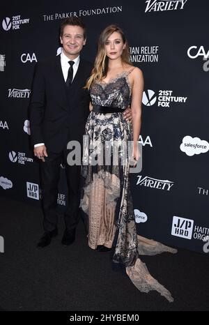 Jeremy Renner and Elizabeth Olsen attends The Sean Penn & Friends 'Haiti Rising' Gala benefiting J/P Haitian Relief Organization held at the Montage Beverly Hills Stock Photo