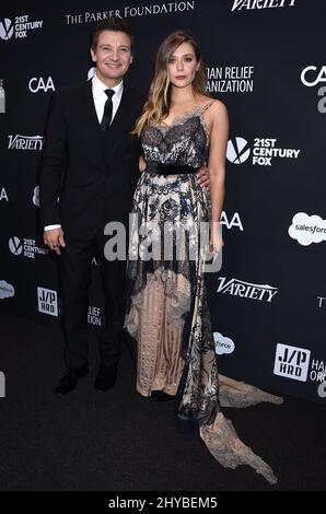 Jeremy Renner and Elizabeth Olsen attends The Sean Penn & Friends 'Haiti Rising' Gala benefiting J/P Haitian Relief Organization held at the Montage Beverly Hills Stock Photo